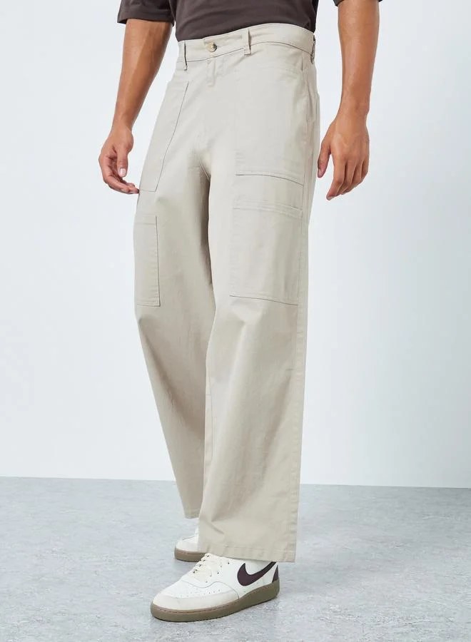 ستايلي بنطال رجالي بقصة فضفاضة وجيوب كارجو