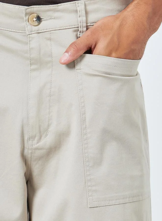 Styli  Men Beige Baggy Fit Trousers with Cargo Pockets for Men | Best Price UAE