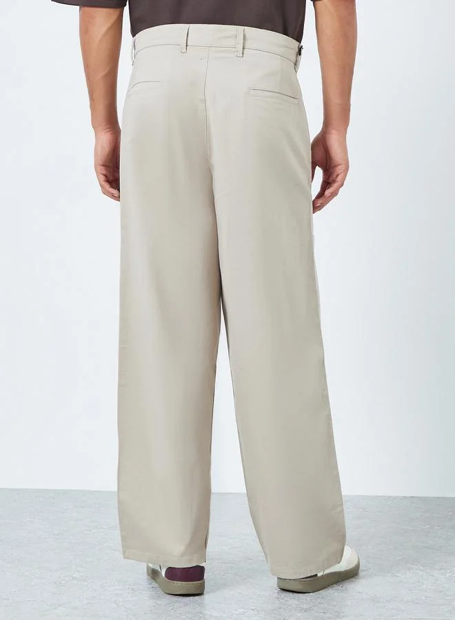 Styli  Men Beige Baggy Fit Trousers with Cargo Pockets for Men | Best Price UAE