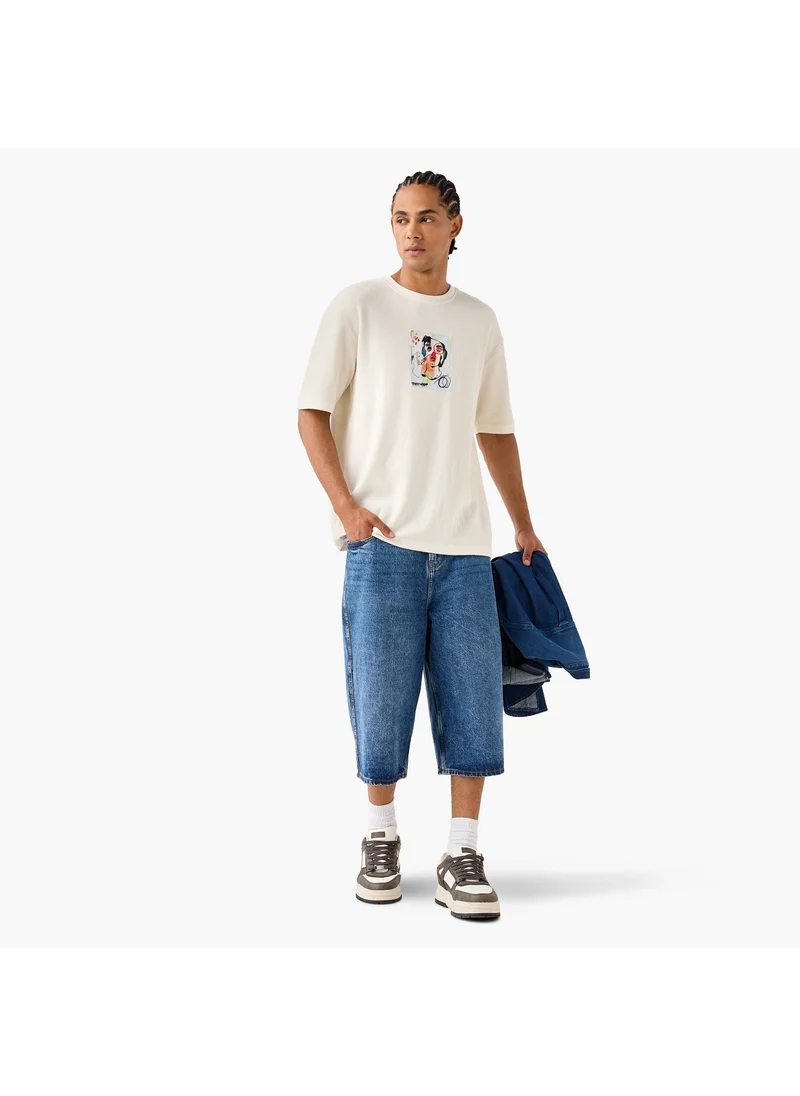 SP Characters Graphic Print Textured T-shirt with Round Neck