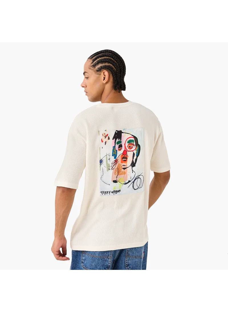 SP Characters Graphic Print Textured T-shirt with Round Neck