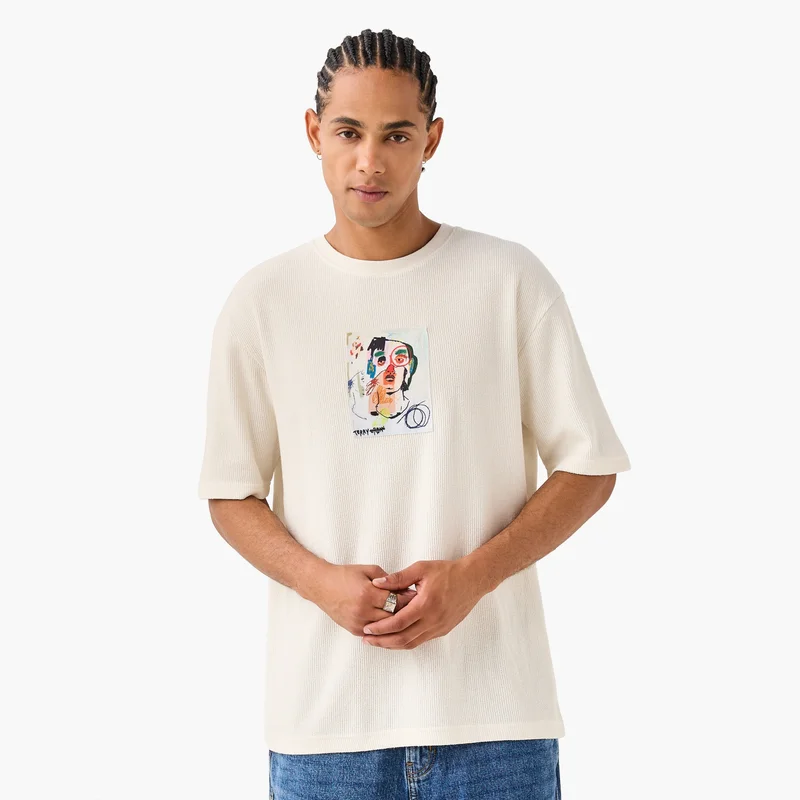 SP Characters Graphic Print Textured T-shirt with Round Neck