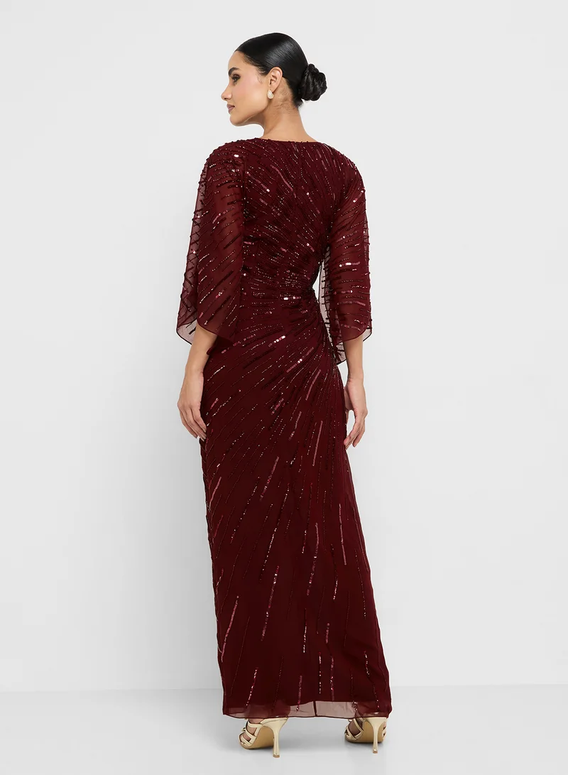 Amelia Rose Side Slit Flared Sleeve Sequin Dress