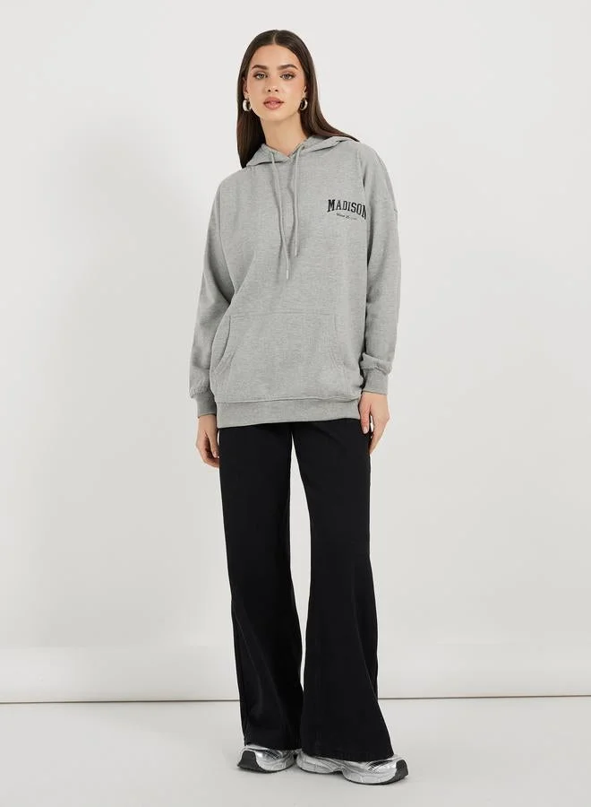 Styli Oversized Longline Slogan Hoodie