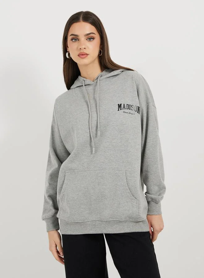 Styli Oversized Longline Slogan Hoodie