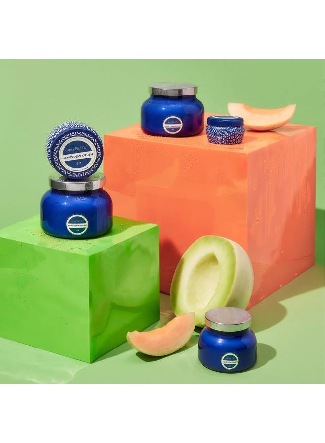 Capri Blue Honeydew Crush cented Candle - Signature Printed Travel Tin Jar Candle - Luxury Aromatherapy Candle with a Soy Wax Blend - Blue Candle (8.5 oz) - Image 5