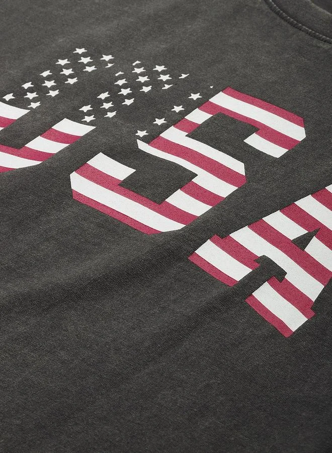 ديلينجر تيشيرت نسائي مطبوع بقصة واسعة وغسيل حمضي