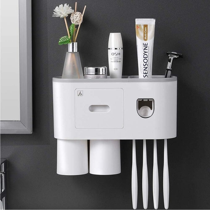 TOOTHBRUSH HOLDER WALL MOUNTED AUTOMATIC TOOTHPASTE DISPENSER SQUEEZER KIT MAGNETIC TOOTHBRUSH HOLDER FOR BATHROOM AND VANITY 4 BRUSH SLOTS 2 CUPS 1 COSMETIC DRAWER