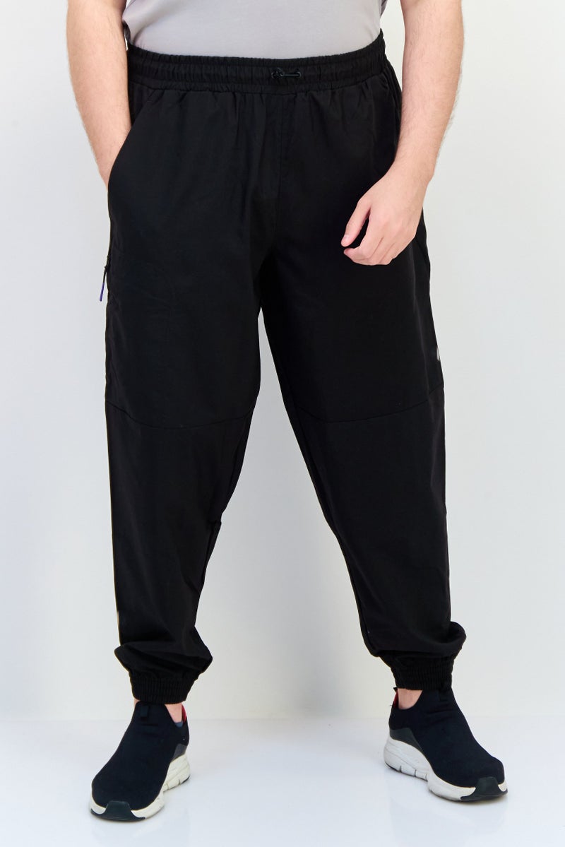 PUMA Men Sportswear Fit Outdoor Sweatpants, Black - Image 1