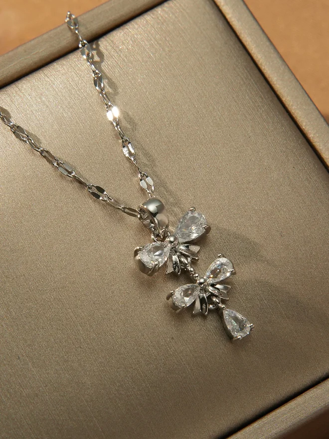 Take Two Embellished Bow Drop Pendant Necklace