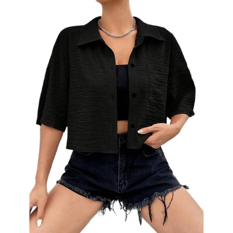 بلوزة نسائية بلون سادة بأكمام قصيرة وأزرار وجيب - Image 5