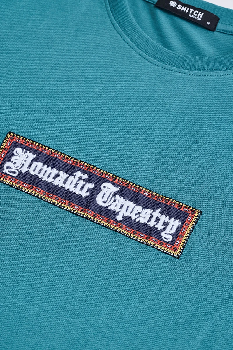 SNITCH تيشيرت واسع بتصميم مرقع