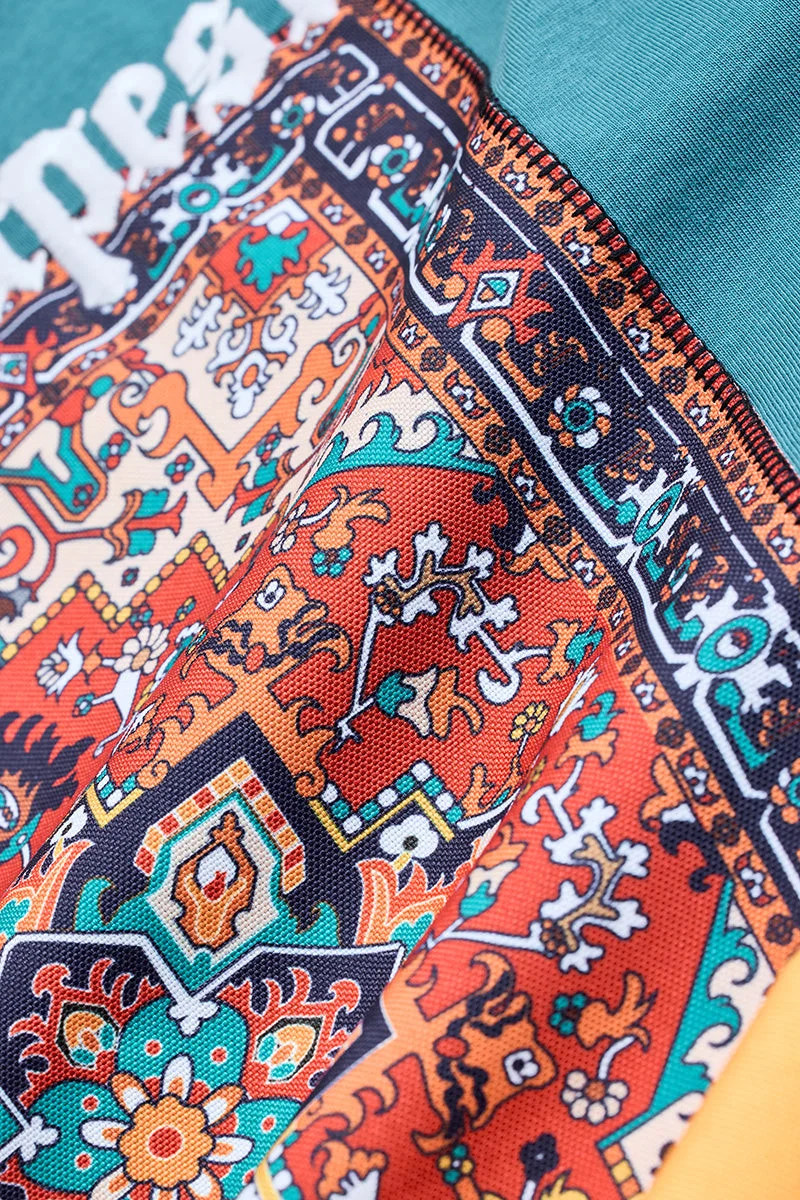 SNITCH تيشيرت واسع بتصميم مرقع