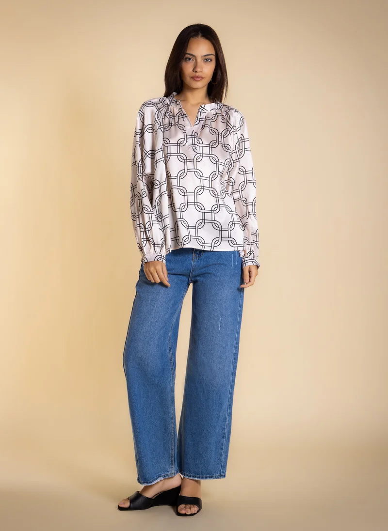 SHAPES PRINTED BLOUSE