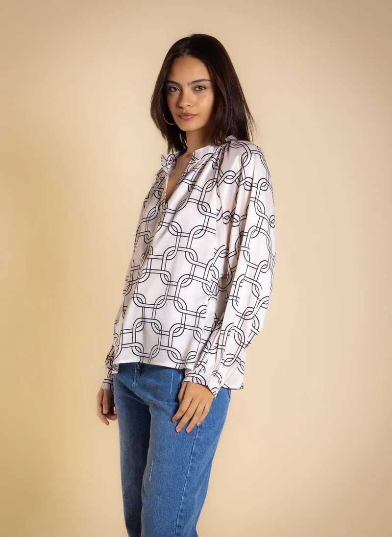 SHAPES PRINTED BLOUSE