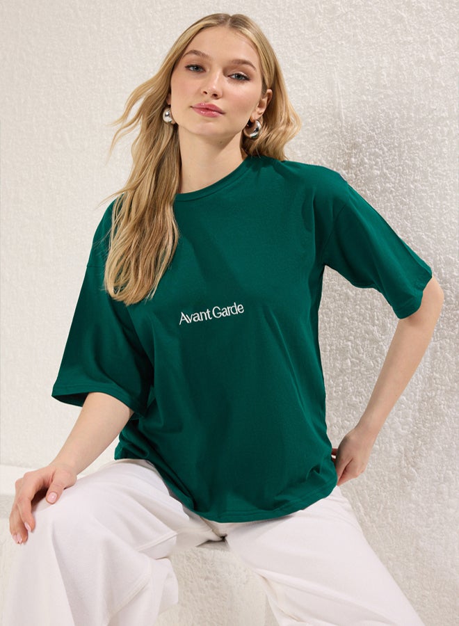 trendyol Emerald Green Slogan Embroidered Relaxed/Wide Comfort Cut Crew Neck T-Shirt  - Image 1