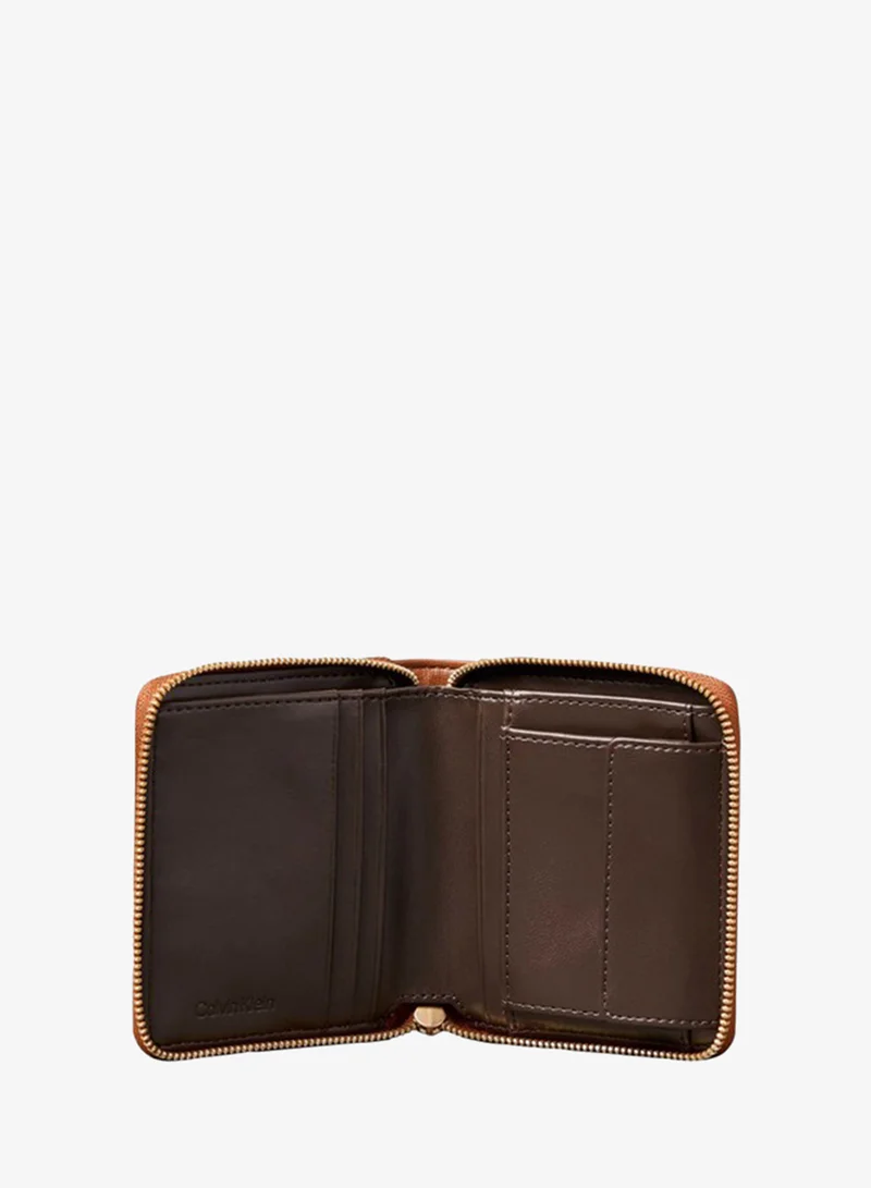 Calvin Klein  Foil Logo Zip Wallet for Women | Best Price UAE