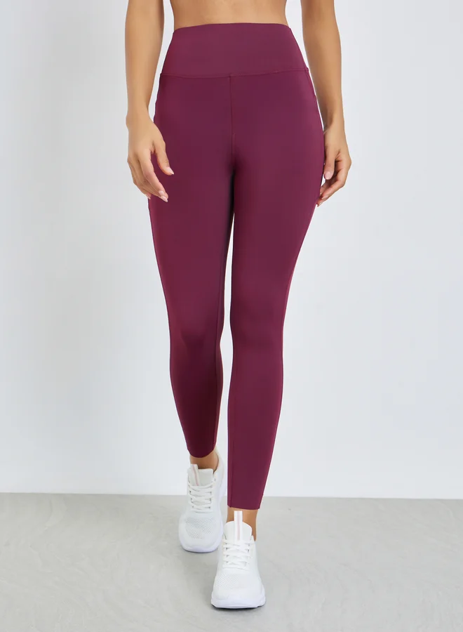 Styli Active Burgundy Broad Waist Side Pocket Leggings