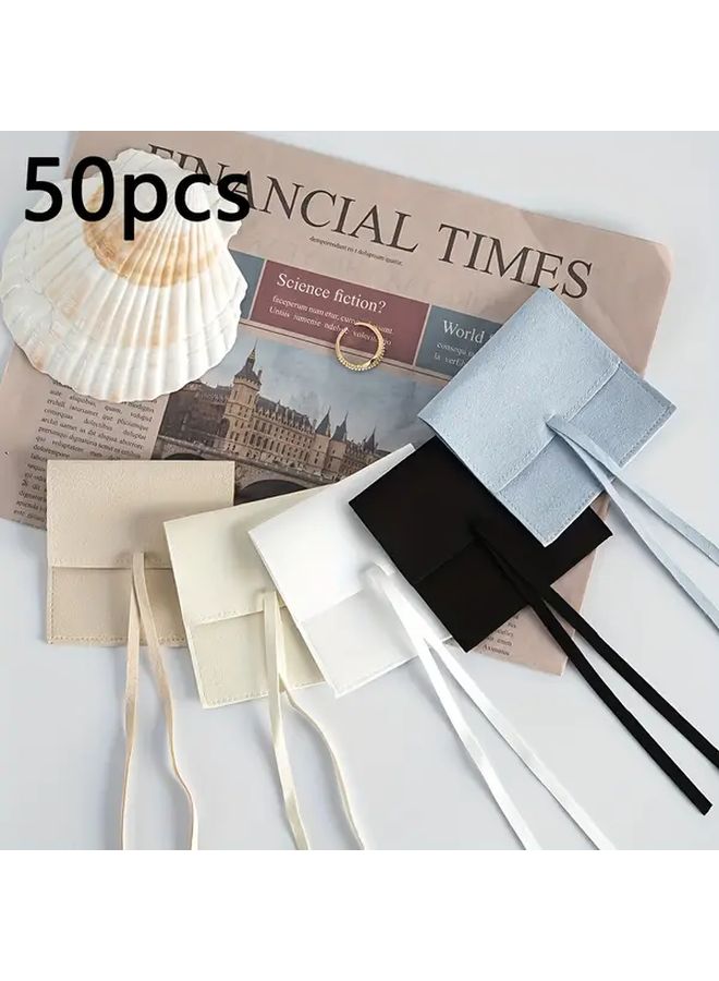 أكياس المجوهرات الباستيل البيضاء الصغيرة 50 حقيبة، أكياس من ميكروفايبر الناعمة بإغلاق شريطي - Image 3