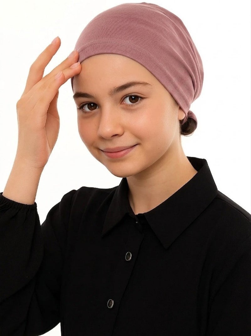 وشاح رأس للأطفال بلون وردي باهت، مصنوع من القطن الناعم والمريح، مثالي للارتداء اليومي للأطفال، مناسب للإطلالات الكاجوال والاستخدام اليومي، يضمن الراحة والأناقة للصغار.