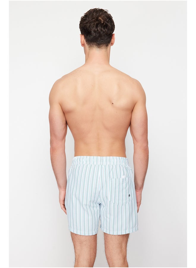 trendyol - شورت سباحة رجالي مخطط من قماش السيرساكر بمقاس قياسي TMNSS24DS00020 - Image 1