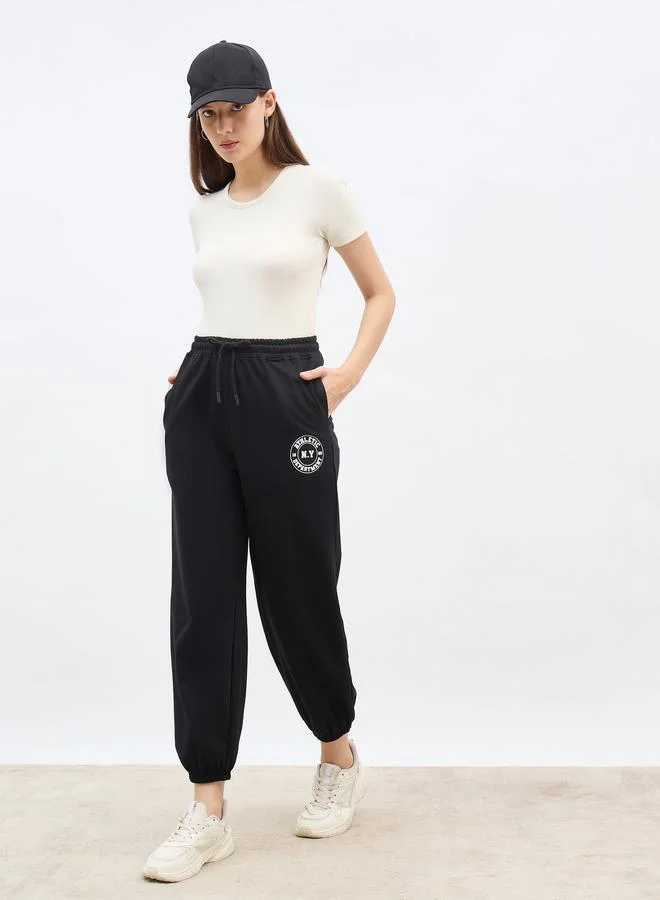 ستايلي Styli Minimal Print Tapered Joggers