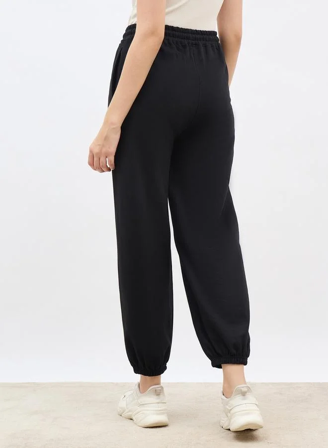 Styli Styli Minimal Print Tapered Joggers