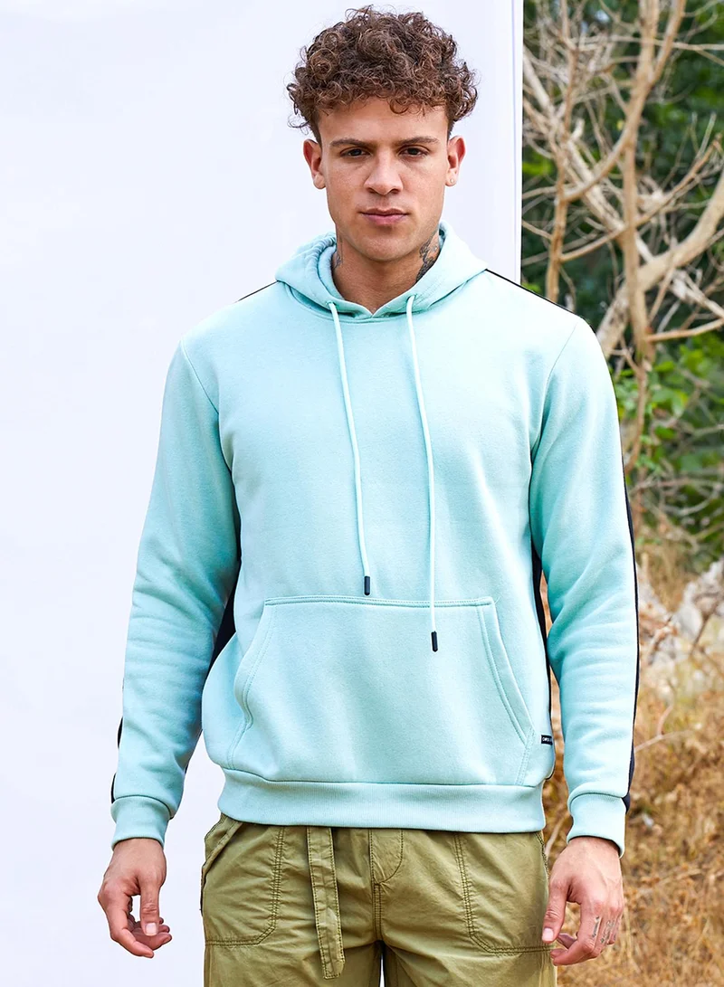 Campus Sutra Men's Sage Green Pullover Hoodie With Contrast Back For Casual Wear | Hooded Neck | Long Sleeve | Pull On Closure | Cotton Sweatshirt Crafted With Comfort Fit For Everyday Wear