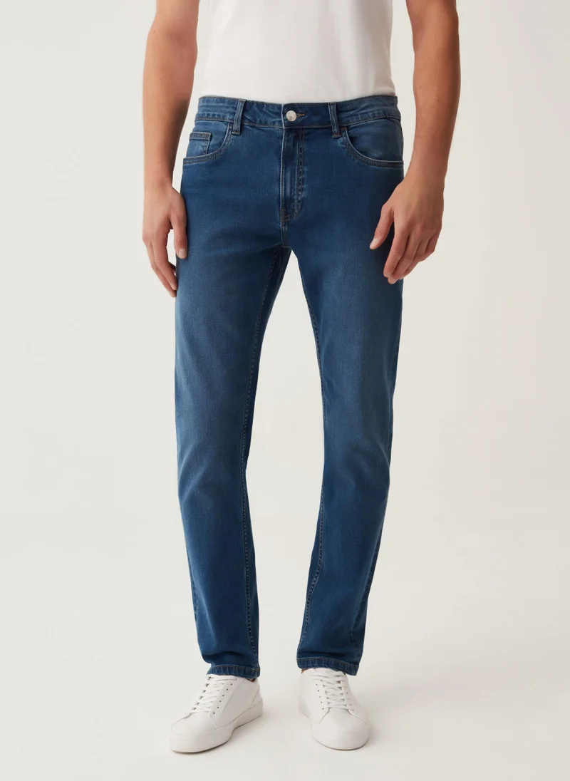 او في اس Slim-fit cross-hatch cotton jeans