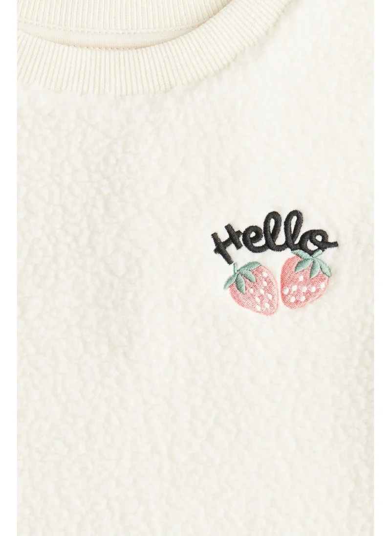 H&M Embroidered teddy sweatshirt