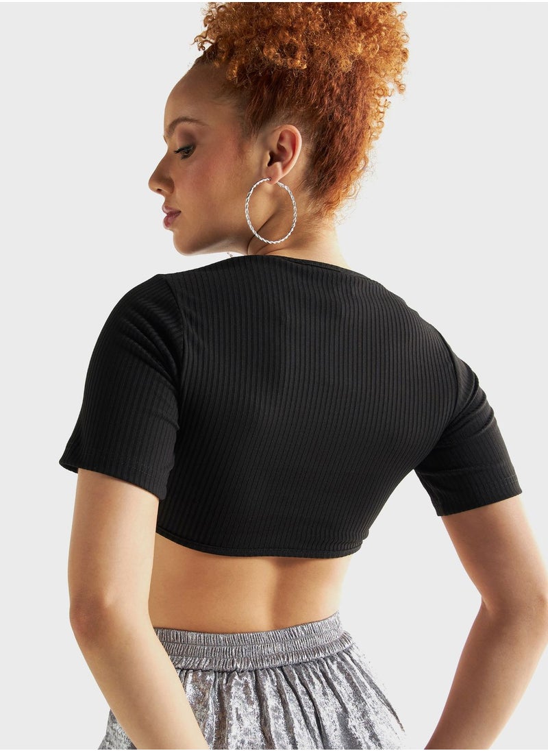 Crew Neck Embellished Crop Top - pzsku/Z5A90623848193F726CEEZ/45/_/1708359762/930e0a33-245a-4499-b62c-35d1fb70dee0