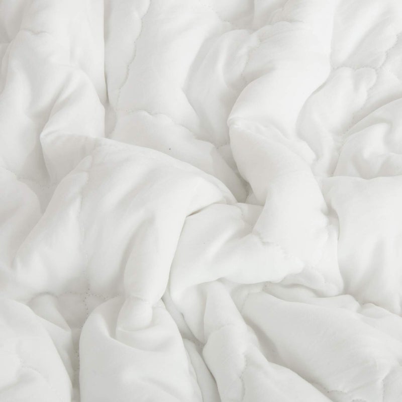 NTBAY Down Alternative Toddler Comforter, Lightweight and Warm Solid Color Baby Crib Quilted Blanket, 39x47 inches, White - Image 2