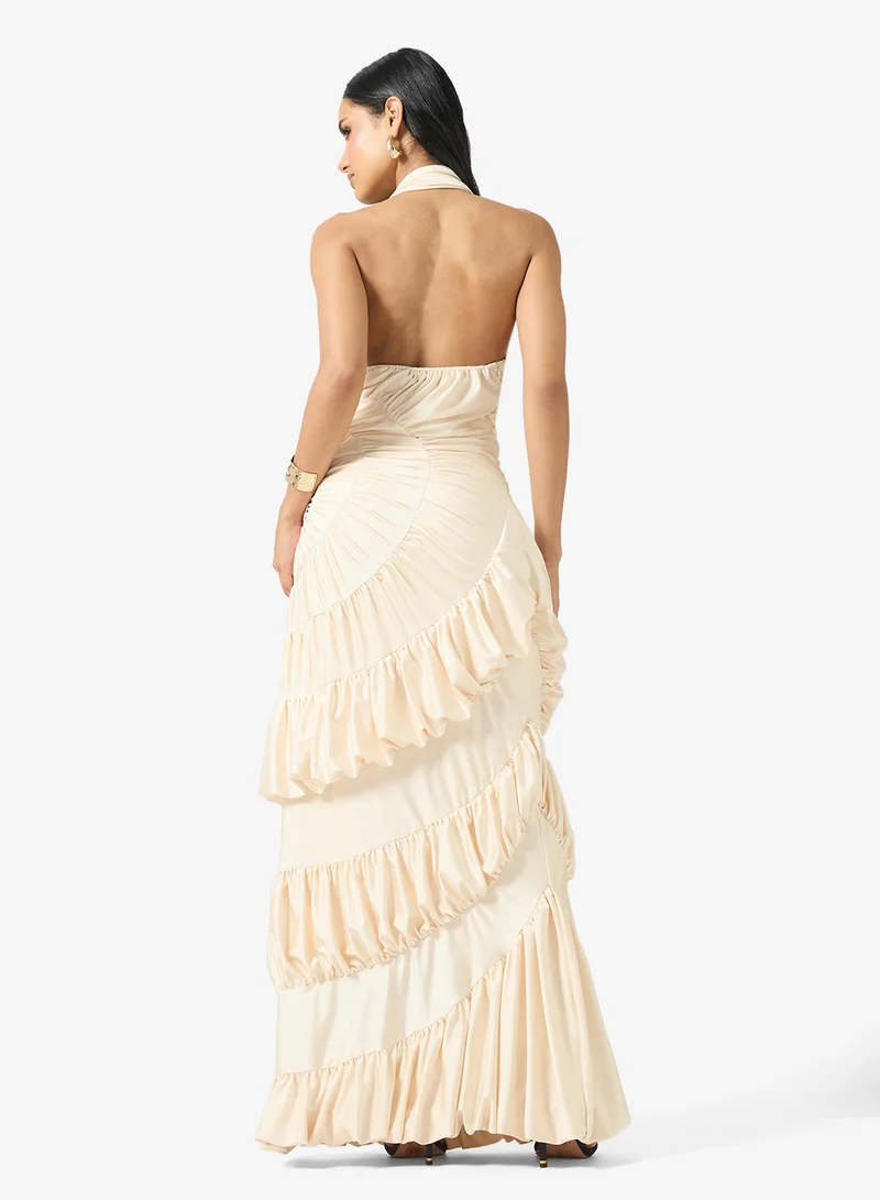 جينجر بوتيك فستان سهرة بياقة هالتر وتفاصيل كشكش مزموم