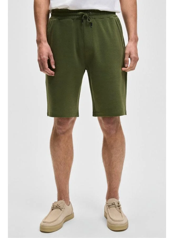 GRIMELANGE CAMILLO Men's Pocket Zipper Elastic Waist Light Khaki Shorts & Bermuda.