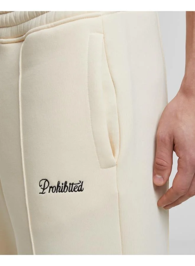 Prohibited Ecru Loose Fit Sweatpants  | Best Price UAE