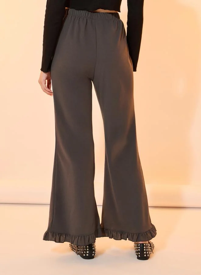 Take Two Solid Pintuck Flared Pants with Ruffled Hem
