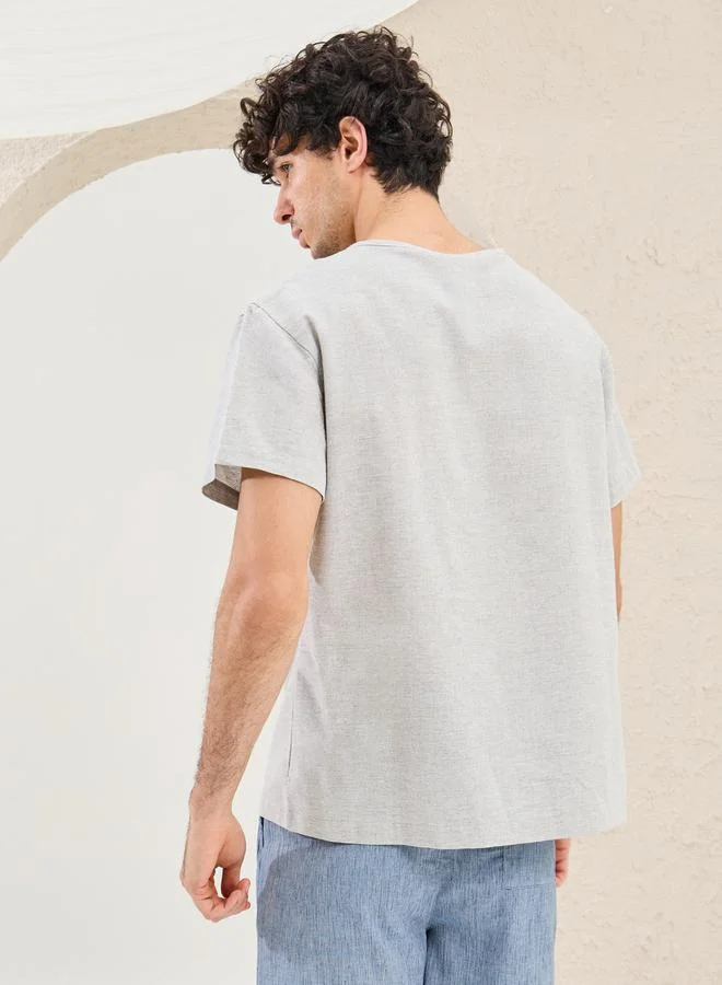 Styli Solid Notch Neck Oversized T-Shirt