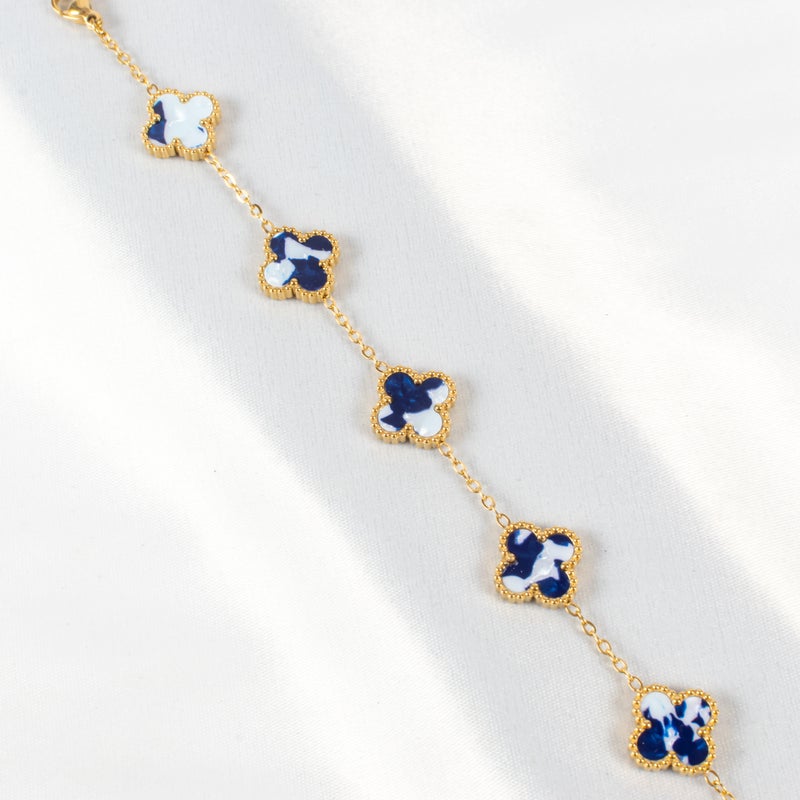 ذا بلاك بيرل اكسسوريز أنسيال أستانليس ستيل ذهبي مع شكل زهرة البرسيم بألوان خلابة - Image 2