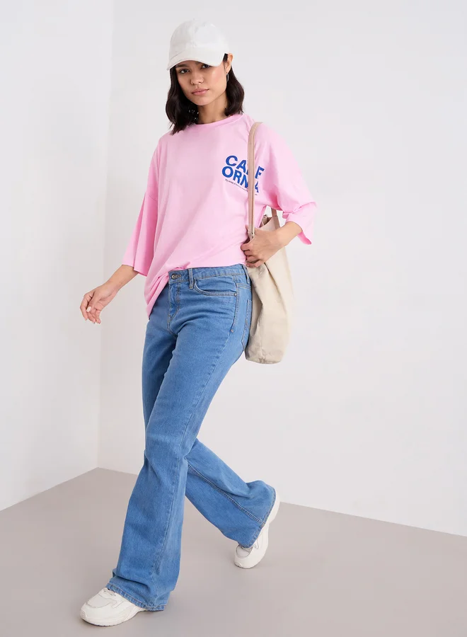 Styli Styli Slogan Print Round Neck Oversized T-Shirt