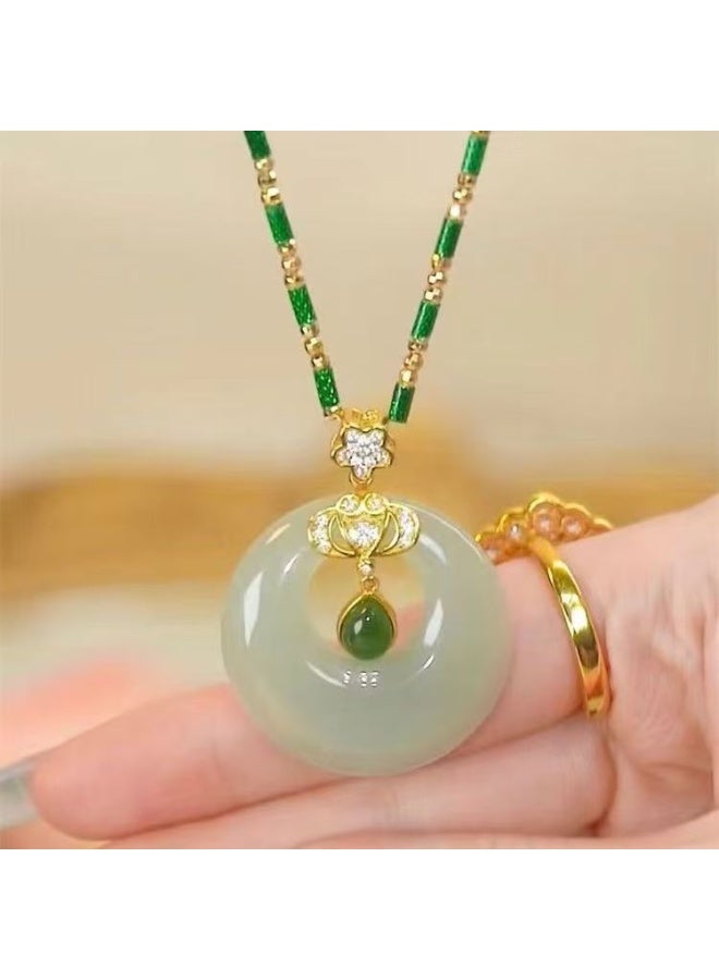 Akali Elegant Green Jade Circle Pendant Necklace with Gold and Diamond Details – Symbol of Harmony and Prosperity - Image 1