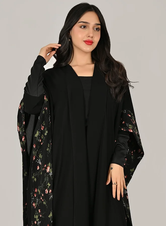 Hawraa Abaya Black Wrap Abaya with a Bisht Design and Floral-Printed Pleated Fabric Accents