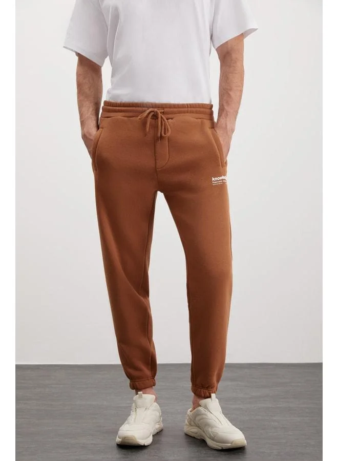 GRIMELANGE LOIC Men's Ultra-Soft Elastic Slim-Fit Three-Pocket Organic Cotton Brown Jogger Pants.