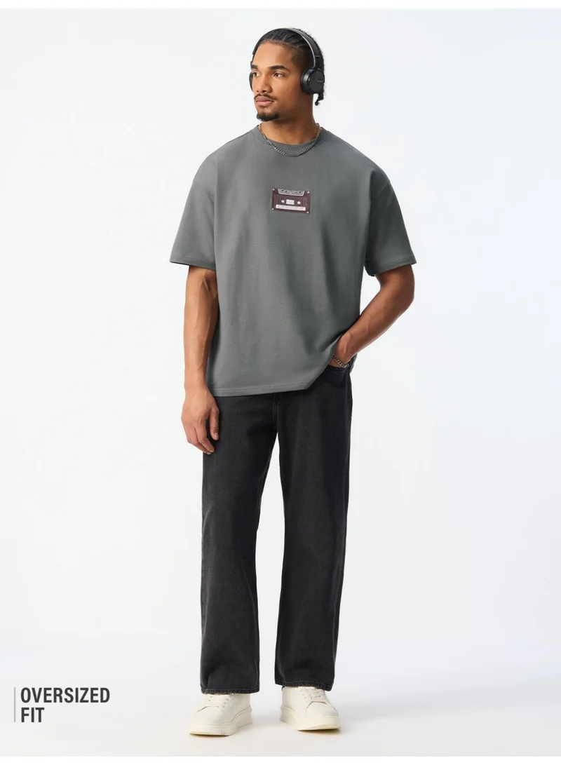 ذا سوليد ستور The Souled Store Oversized T-Shirt: Cassette Men and Boys Short Sleeves Round Neck Charcoal Grey Embroidered Retro Graphic Oversized T-Shirts