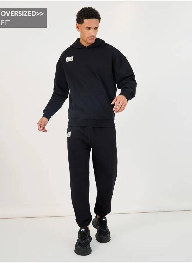 Styli Styli Patch Detail Fleece Oversized Hoodie and Cuffed Joggers Co-Ords