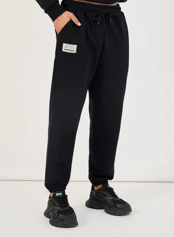 Styli Styli Patch Detail Fleece Oversized Hoodie and Cuffed Joggers Co-Ords