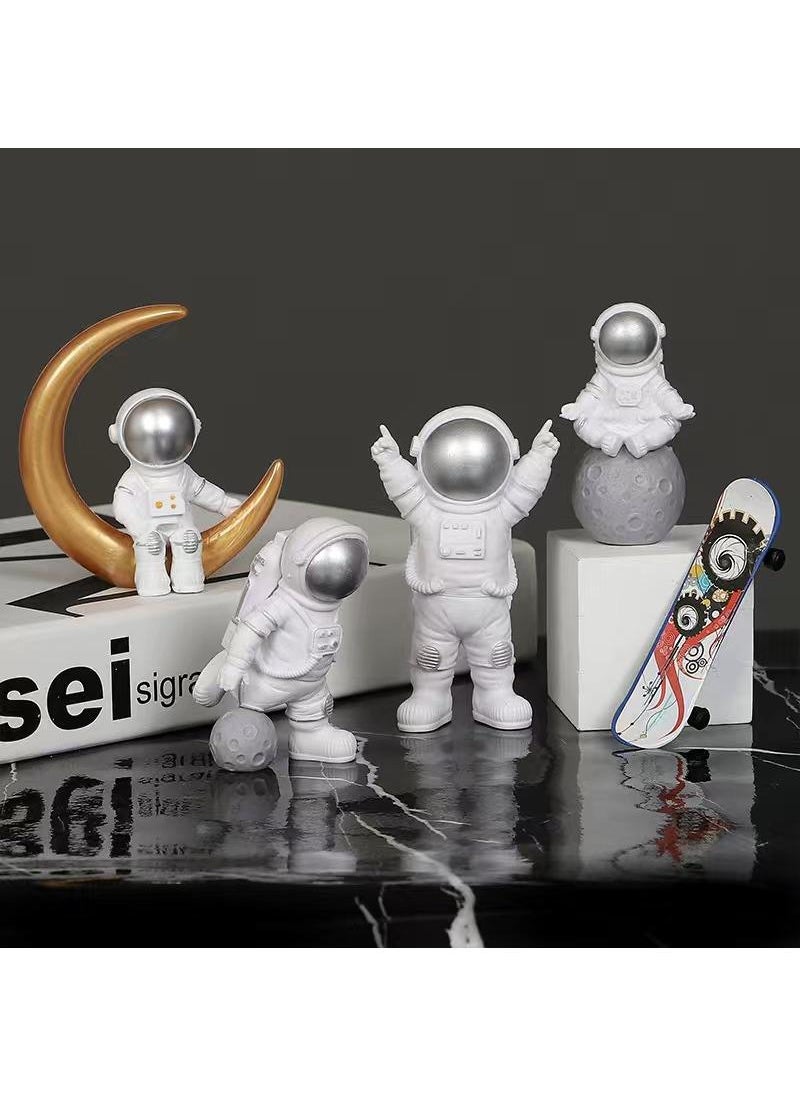 Bluejw 4-Piece Astronaut Figurine Statue Set Astronaut Figure Sculpture For Desktop And Tabletop Decor Resin Spaceman Planet Desk Ornament For Outer Space Themed Bedroom Decor Cake Toppers Decoration Model Set  - Image 1
