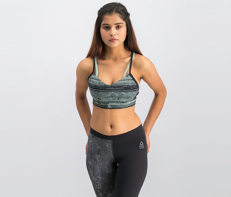 Reebok Women Strappy Sports Bra, Black and Green - Image 1