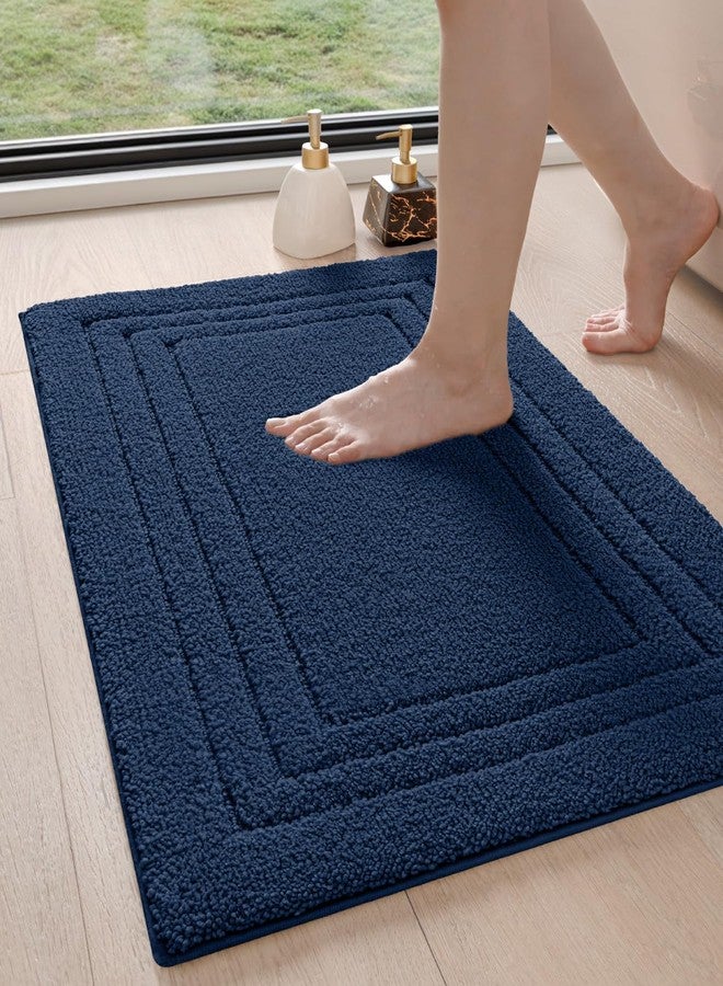 DEXI Bathroom Rug 24x16, Ultra Soft Absorbent Bath Mats for Bathroom, Shower Floor Bathmat Non Slip, Washable Bath Rugs Carpet for Tub, Sink, Navy - Image 1