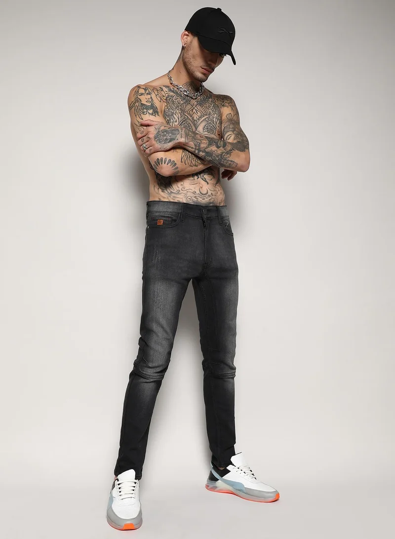 Campus Sutra Men's Black Self-Design Patched Stitched Denim Jeans