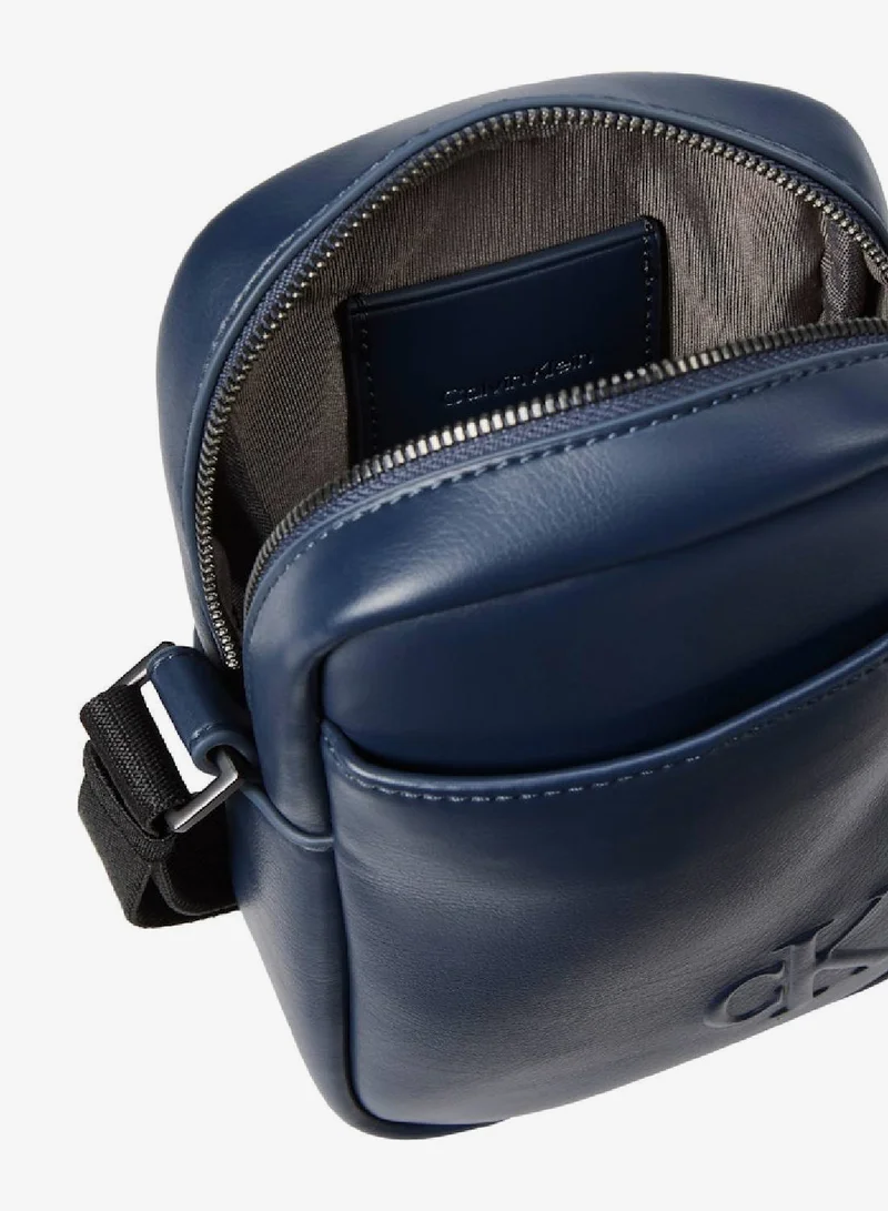 Calvin Klein Blue Nights Bold Ck Logo Slim Reporter Bag for Men | Best Price UAE